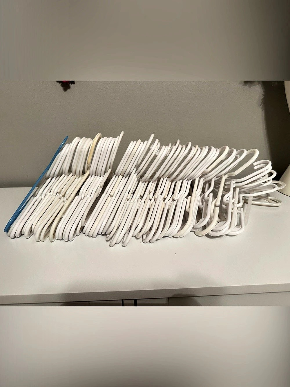 White & one blue baby/toddler Hangers 62